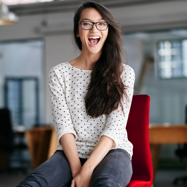 Happy woman in chair