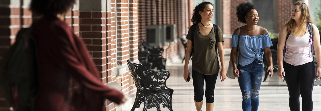 three students walking