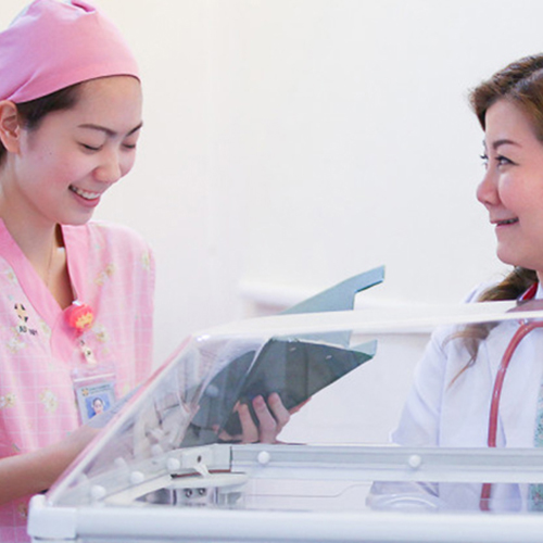 Two nurses looking at each other